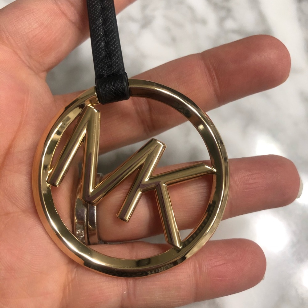 NWOT Michael kors golden black bag charm
